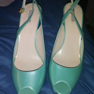 Peep toed sling backs